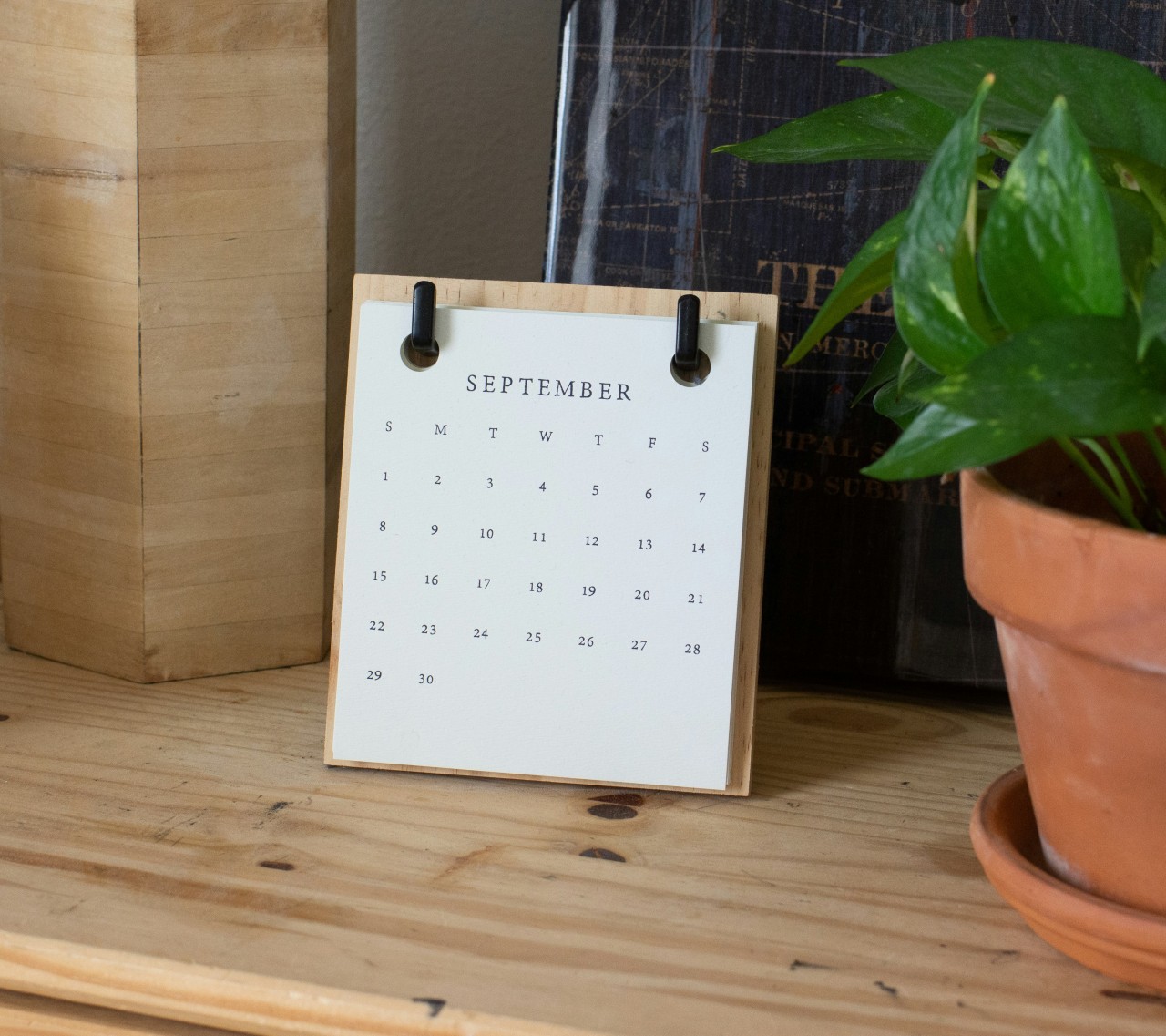 Calendar sitting on a desk showing September